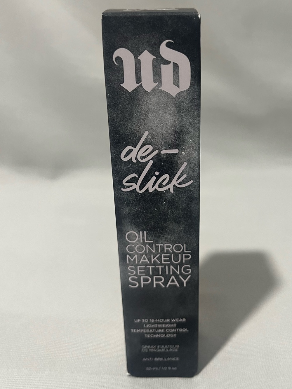 Urban Decay De-Slick Makeup Setting Spray in Black Packaging